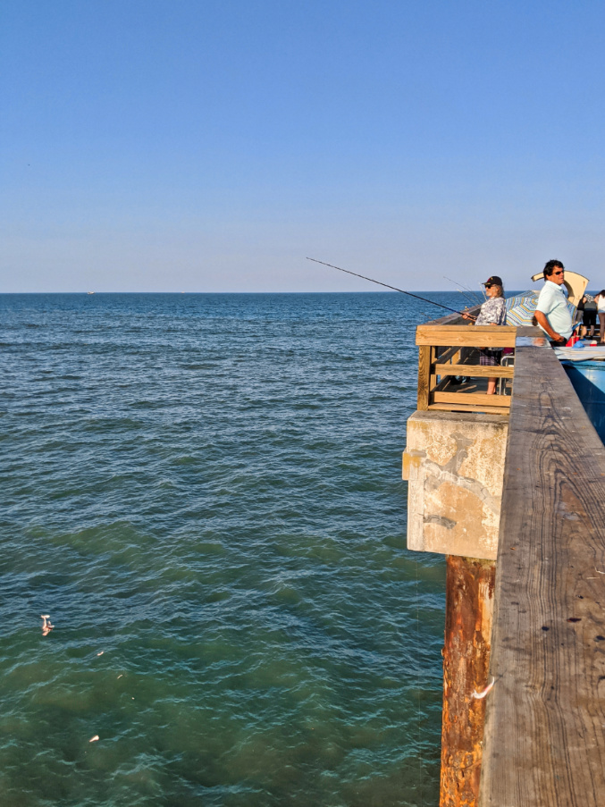 People Fishing on St Johns County Ocean and Fishing Pier St Augustine Beach Florida 1