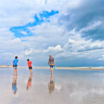 Taylor Family walking on Butler Beach with Storm Clouds St Augustine Florida 1